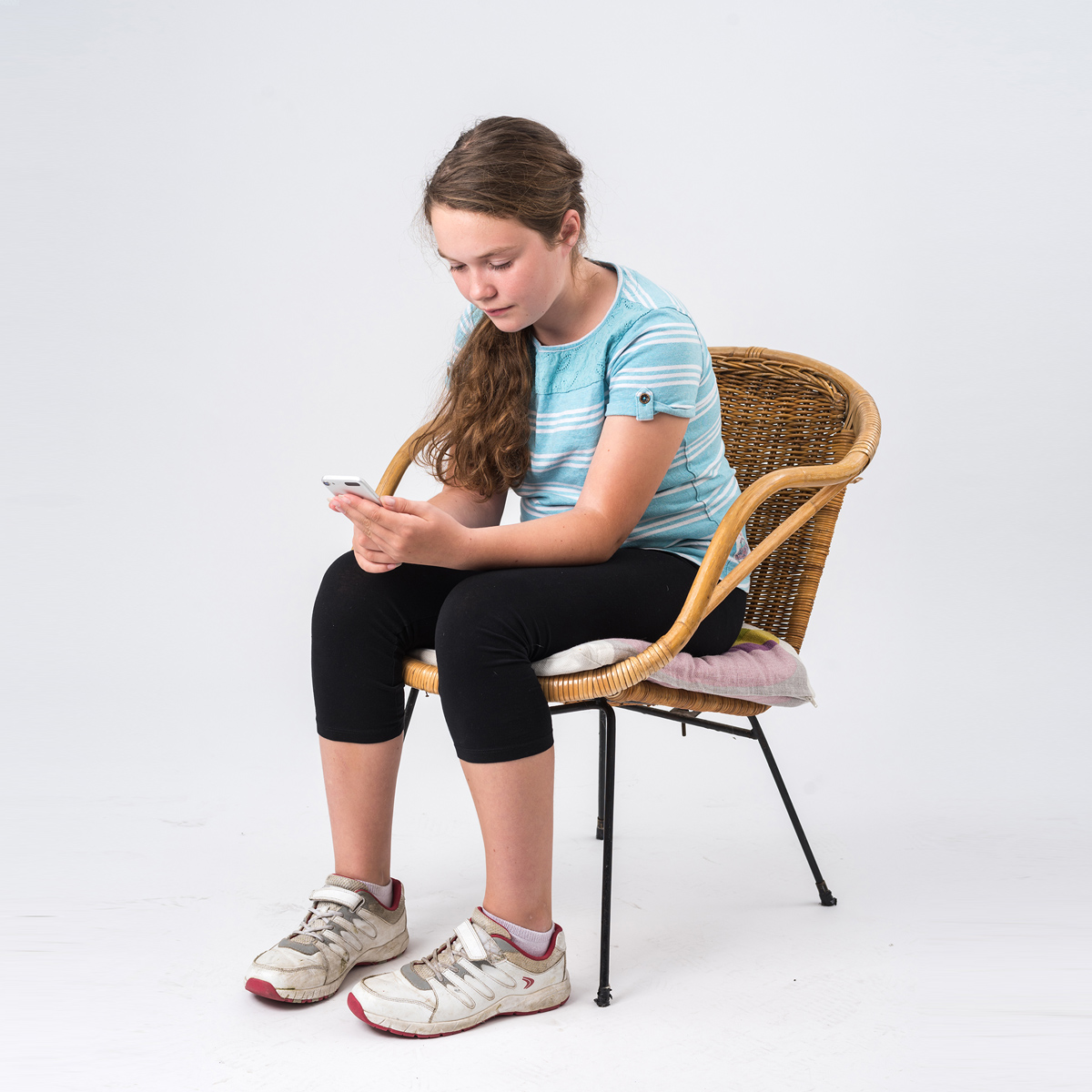 Girl sitting on mobile